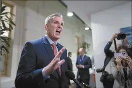  ?? AP photo ?? Following a closed-door Republican strategy session, Speaker of the House Kevin McCarthy, R-Calif., talks to reporters about funding the government and averting a shutdown, at the Capitol in Washington on Wednesday.