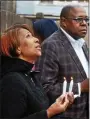  ?? TOM KELLY III – DIGITAL FIRST MEDIA ?? Tracey Lawson prays to the heavens as The Rev. Dr. Vernon Ross addresses the crowd during a vigil for Pottstown homicide victim Siani Overby in the 300 block of Johnson Street in April 2018.