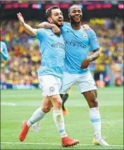  ?? Alex Morton Getty Images ?? RAHEEM STERLING, left, scored twice during Manchester City’s 6-0 victory in the FA Cup final.