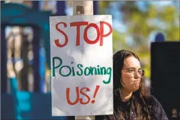  ?? Allen J. Schaben Los Angeles Times ?? SARAH OLAGUEZ joins residents of Val Verde and Castaic demanding Chiquita Canyon Landfill be closed. At least one lawsuit has been filed to force its closure.