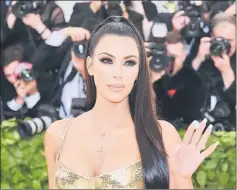  ??  ?? Kim Kardashian arrives for the 2018 Met Gala recently, at the Metropolit­an Museum of Art in New York. — AFP file photo