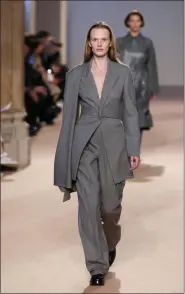  ?? ANTONIO CALANNI - ASSOCIATED PRESS ?? A model wears a creation as part of the Salvatore Ferragamo women’s Fall Winter 2020-21 collection, unveiled Saturday during Fashion Week in Milan, Italy.