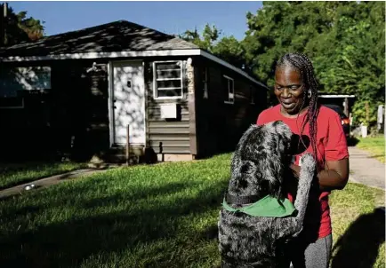  ?? Elizabeth Conley/Staff photograph­er ?? Sandra Edwards, longtime community organizer and Fifth Ward resident who lives across the street from the Union Pacific rail yard, says developmen­ts in cleaning up the site are welcome, but there’s more to be done for area residents.