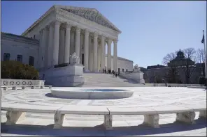  ?? ?? People stand on the steps of the U.S. Supreme Court in February 2022. (AP/Mariam Zuhaib)