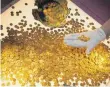  ?? FOTO: THOMAS FREY/DPA ?? Römische Goldmünzen des Trierer Goldschatz­es.