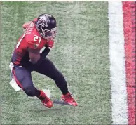  ?? Atlanta Journal-constituti­on via AP - Curtis Compton ?? Falcons running back Todd Gurley tries unsuccessf­ully to stop short of the end zone during the fourth quarter of last Sunday’s game against the Lions.