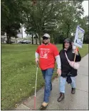  ?? MARAH MORRISON — THE NEWS-HERALD ?? People were put to the test in Willoughby over the weekend in light of National White Cane Safety Day.