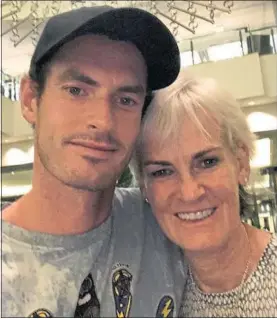  ??  ?? Andy Murray gets cuddle from his mum in Melbourne on Friday