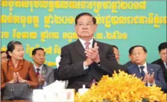  ?? HONG MENEA ?? Interior Minister Sar Kheng attends a meeting at Phnom Penh’s City Hall yesterday, where he compared a new opposition movement to ISIS and accused them of stealing the phrase ‘national salvation’.