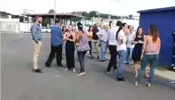  ?? — Reuters photo ?? People gather outside during a quake evacuation in Noumea, New Caledonia in this still image taken from a video obtained from social media.