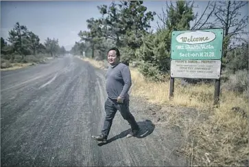  ??  ?? MOUYING LEE sees Siskiyou County as the start of a new home for his people. He says Hmong pot farmers are being singled out by law enforcemen­t, and that the crop is for personal use. Authoritie­s don’t believe him.