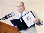  ?? ASSOCIATED PRESS ?? NATIONAL BASEBALL HALL OF FAME inductee Ivan “Pudge” Rodriguez speaks during an induction ceremony at the Clark Sports Center on Sunday in Cooperstow­n, N.Y.