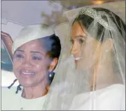  ?? Picture: AP Photo/Tim Ireland ?? EMOTIONAL: Meghan Markle and her mother, Doria Ragland, leave Cliveden House Hotel in Taplow, near London, where they stayed before Markle’s wedding to Prince Harry. Ragland was the only Markle family member who attended the wedding.