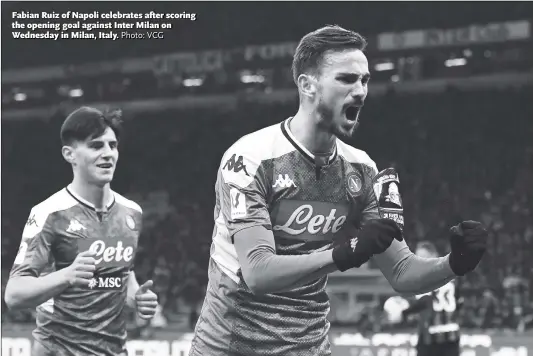  ?? Photo: VCG ?? Fabian Ruiz of Napoli celebrates after scoring the opening goal against Inter Milan on Wednesday in Milan, Italy.