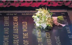  ??  ?? The Duchess of Sussex’s wedding bouquet is laid on the grave of the Unknown Warrior