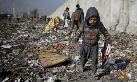  ?? Photograph: Altaf Qadri/AP ?? A child in Kabul, Afghanista­n, which is among the poorest countries in the world.