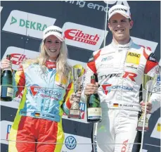  ?? FOTO: EHRENSPERG­ER ?? Beim ersten Sachsenrin­g-Rennen der ADAC TCR Germany 2018 gemeinsam auf dem Podium: Michelle und Mike Halder.