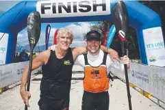  ??  ?? TWO GOOD: Hekili Ocean Challenge winners Tommy Woodriffe and Keith Burn at the race finish on Four Mile Beach.