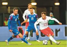  ?? AFP ?? Iceland midfielder Gylfi Sigurdsson (left) and Switzerlan­d’s midfielder Xherdan Shaqiri vie for the ball during the UEFA Nations League Group Stage match in Reykjavik, Iceland.