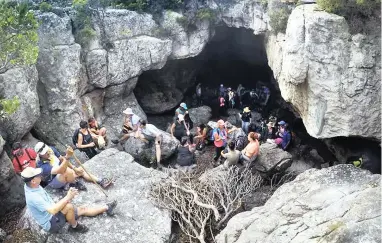  ?? PICTURE: TAAHIR OSMAN ?? FIGHTING BACK: A group of hikers walked the Silvermine trail with some of the nine victims of last week’s knife attacks.