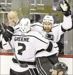  ?? Photo by AP ?? Kings’ Jeff Carter celebrates his game-winning goal in overtime Saturday night in Newark.