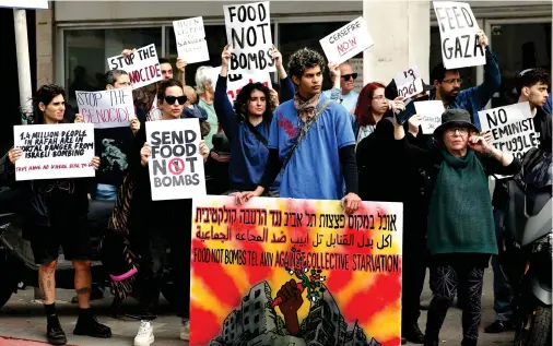  ?? AFP ?? There has been a dramatic increase in the intensity, severity and regularity of both Israeli settler and state violence against Palestinia­ns in the occupied West Bank.
Americans and Israelis protest in front of the US Embassy’s branch in Tel Aviv demanding that the US stop arming Israel to end the war in Gaza.