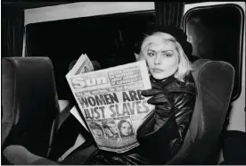  ?? Debbie Harry reading the Sun, photograph­ed by Blondie’s Chris Stein, 1979. Photograph: Chris Stein/Rednight Inc. ??