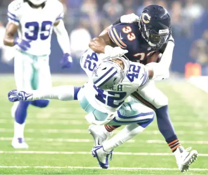  ?? | AP ?? Bears running back Jeremy Langford, who had three carries for 31 yards, left with an ankle injury in the second half.