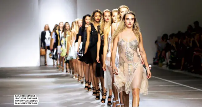  ??  ?? CARA DELEVINGNE LEADS THE TOPSHOP RUNWAY AT LONDON FASHION WEEK 2014