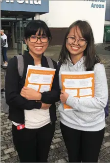  ??  ?? Ging and Karalin Tan from Kuala Lumpur. Above Right: Shauna Maguire and Orla McGuinness at the IT Sligo first year induction day yesterday, (Monday).