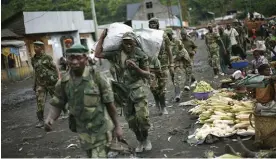  ?? Arkivbild: JEROME DELAY ?? REBELLER. Medlemmar i rebellgrup­pen M23 i Kongo-Kinshasa.