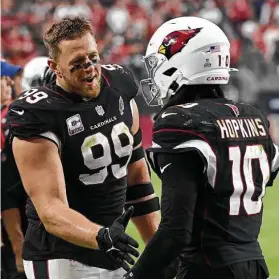  ?? Norm Hall / Getty Images ?? J.J. Watt (99) asked for and was granted his release during the offseason, after which he reunited with former Texans star DeAndre Hopkins in Arizona.