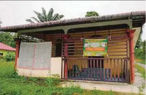  ?? PIC BY ADIE SURI ZULKEFLI ?? The house used as a religious school for Rohingya children in Kampung Jawa, near Kuala Ketil.