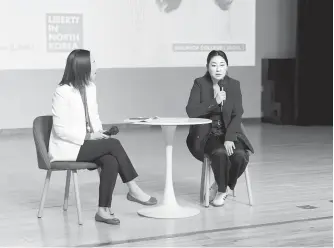  ?? Courtesy of Sam Wiggington ?? North Korea refugee activist Hannah Song, right, responds to a question from Namju Cho, director of communicat­ions and marketing at Dulwich College Seoul, March 20.