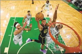  ?? Kyle Terada Associated Press ?? STEPHEN CURRY scored 43 points Friday night as Golden State won to tie the NBA Finals at 2-2. “We have to respond to that,” Boston guard Jaylen Brown said.