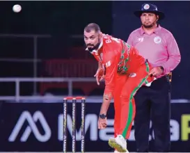  ?? ?? Oman’s Bilal Khan took three wickets for just 20 runs from his four overs