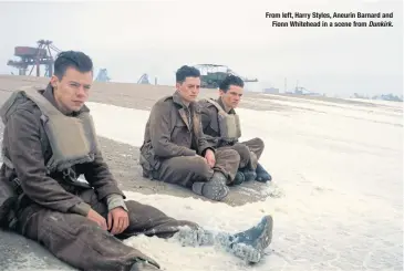  ??  ?? From left, Harry Styles, Aneurin Barnard and Fionn Whitehead in a scene from Dunkirk.