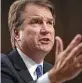  ?? Saul Loeb / AFP/Getty Images ?? The Senate confirmed Brett Kavanaugh with a 50-48 vote Saturday.