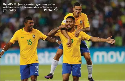  ??  ?? Brazil's G. Jesus, center, gestures as he celebrates with teammates, after scoring yesterday Photo: AP