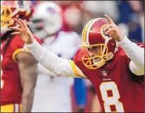  ?? MARK TENALLY/THE ASSOCIATED PRESS ?? Redskins quarterbac­k Kirk Cousins has 16 TD passes and four rushing scores in the last eight games. Washington can clinch the NFC East tonight.