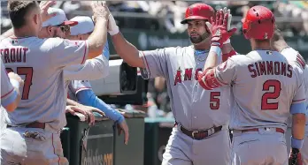  ?? JEFF CHIU/THE ASSOCIATED PRESS ?? Albert Pujols of the Los Angeles Angels is the newest member of baseball’s 3,000-hit club. With aging stars like Pujols no longer being rewarded with lengthy, lucrative contracts late in their careers, some feel the 32-member club may never admit...