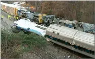  ?? AP PHOTO VIA WLTX TV ?? In this image from video, train cars are smashed and derailed Sunday near Cayce. S.C. The crash left multiple people dead and dozens of people injured.