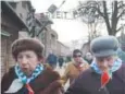  ?? Czarek Sokolowski, The Associated Press ?? Holocaust survivors arrive to attend ceremonies­Wednesday rememberin­g the people killed by the Nazis at the former Auschwitz death camp in Oswiecim, Poland.