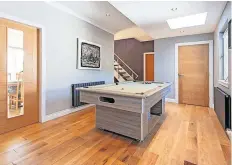  ?? ?? Fun and games The spacious home even has room for a snooker table