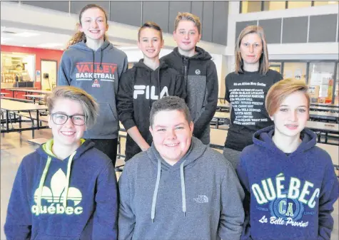  ?? SARA ERICSSON ?? Danielle LeBlanc (far right, back row) stands with six students who travelled with her to Quebec City. Pictured are, from left, front row: Bridgette Hire, Zach Johnson and Kira Kennie; back row: Molly Steadman, Jacob Drennan and Thomas Gaskins.