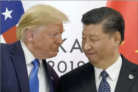  ?? SUSAN WALSH — THE ASSOCIATED PRESS FILE ?? In this June 29. 2019, file photo, President Donald Trump, left, meets with Chinese President Xi Jinping during a meeting on the sidelines of the G-20 summit in Osaka, Japan.