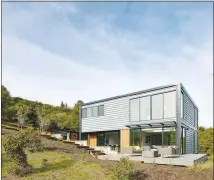  ?? CONNECT HOMES VIA THE NEW YORK TIMES ?? A Connect Homes prefab unit occupies a hillside in Orinda, Calif. Less than 3 percent of housing starts in the United States in 2016 were some sort of prefab, but if ever there was a time and place for prefab to f launt its virtues, it is now, after...