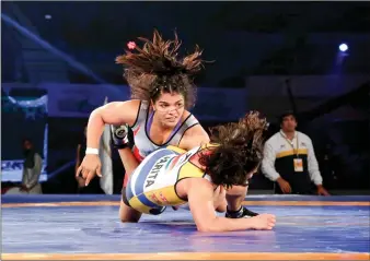  ?? PHOTO: ABHISHEK SHUKLA ?? Sakshi Malik in action against Sarita.