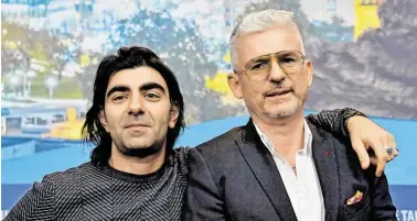  ?? BILD: SN/AFP/J. MACDOUGALL ?? Vom Roman zum Film: Regisseur Fatih Akin und Autor Heinz Strunk.