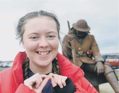  ??  ?? Heart transplant youngster Kayleigh Llewellyn, 13, with the ring from her donor ahead of her charity walk from South Shields to Seaham.